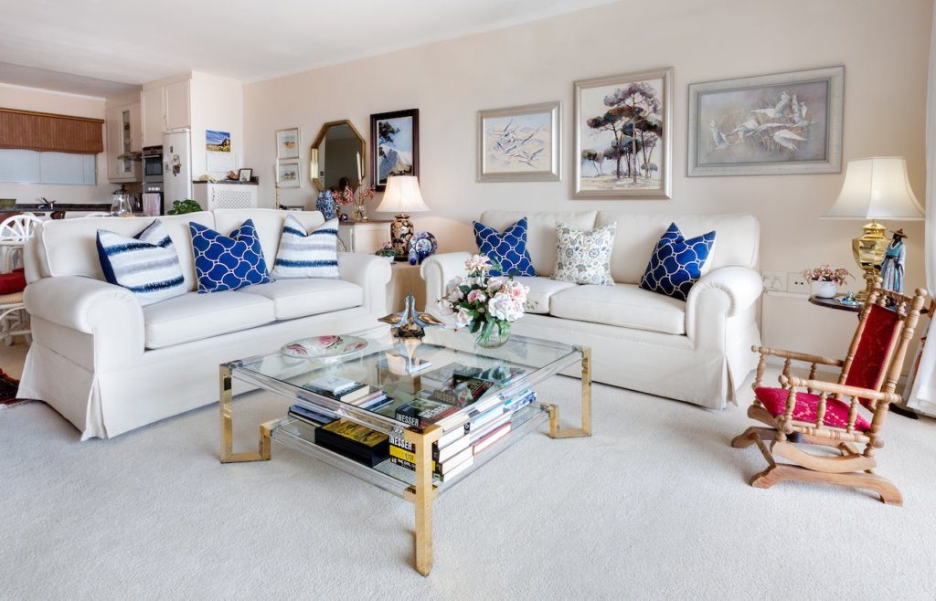a colorful and flashy living room as one of the home staging mistakes